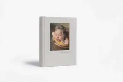 Baby sleeping in a cozy blanket, perfect for maternity and newborn memories.